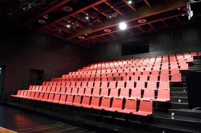 Tiered Ingracia auditorium for corporate keynotes and professional presentations.