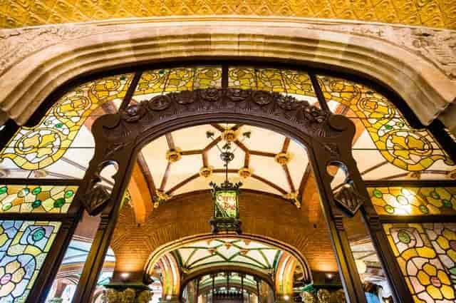 Ornate foyer of Palau de la Música Catalana for upscale VIP event venue hire.