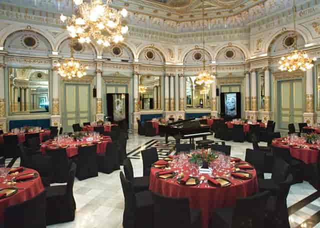 Grand piano in the ornate Gran Teatre del Liceu foyer, elegant gala and formal event setting.