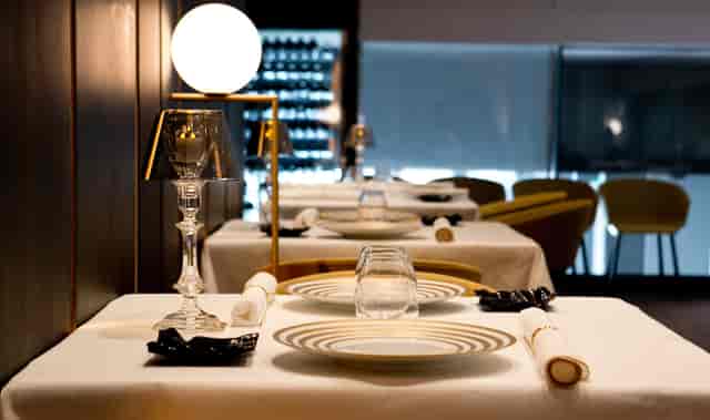 Elegant Caelis main room dining setup for executive VIP dinners and corporate events.