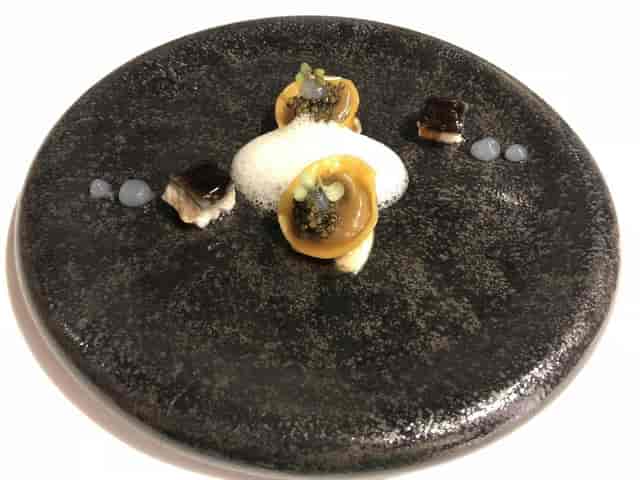 Avant-garde amuse-bouche at Lasarte restaurant, ideal for luxury VIP gala dining.