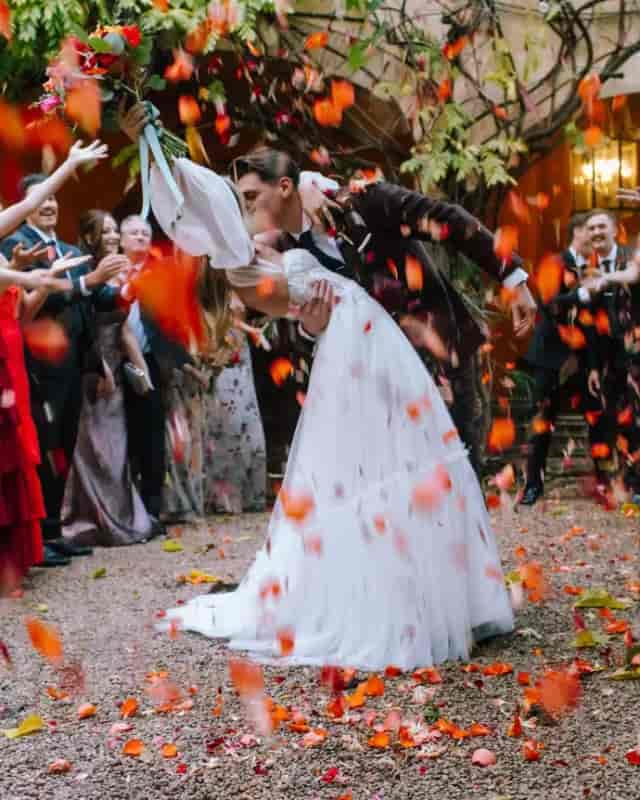 Ballroom wedding exit at Villa Almanita with dramatic lighting and choreographed guest send-off.