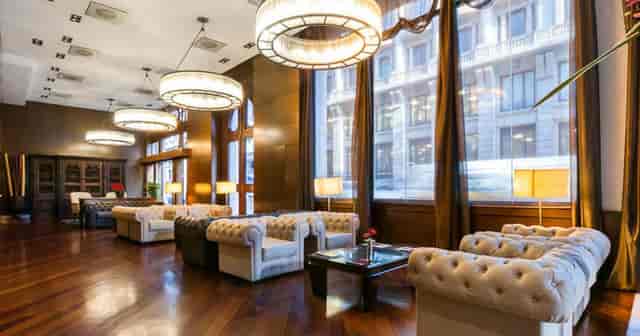 Sophisticated Hotel Colonial Barcelona lounge for networking and corporate events.