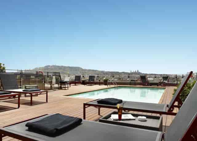 Hotel 1898 rooftop venue for upscale post-conference reception and exclusive VIP mixer.