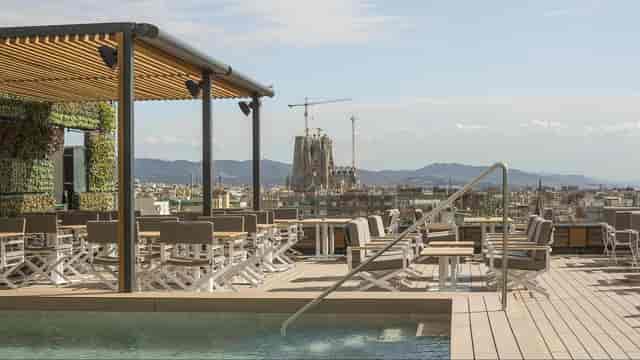 Rooftop terrace in Barcelona with Sagrada Família view for corporate networking and cocktail events.