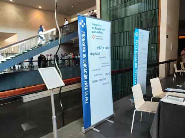Event signage at Palau de Congressos de Catalunya meeting rooms for conference registration.