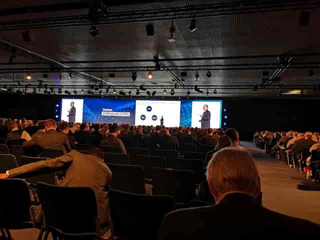 CCIB Barcelona plenary stage with multi-screen setup for corporate conference and event.