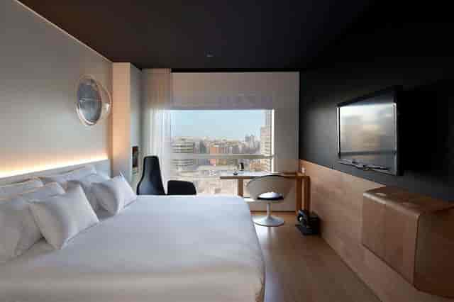 Luxury executive hotel suite with city views for corporate events and VIP business conferences.