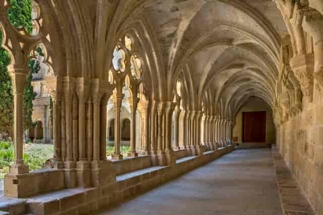 Historic Pedralbes Monastery cloister for high-end cocktail reception and art installation.