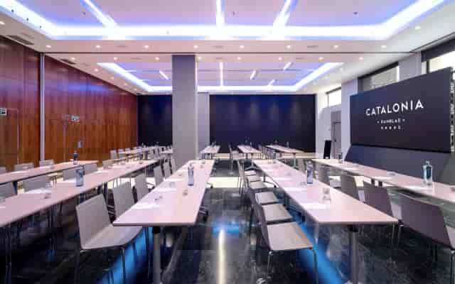 Classroom-style corporate training suite at Catalonia Ramblas for seminars.