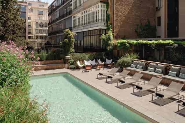 Outdoor terrace at Alexandra Barcelona Hotel for corporate networking and executive retreats.