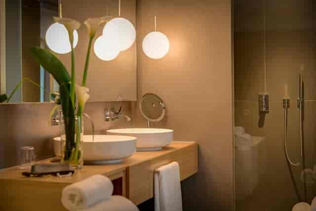 Modern vanity in luxury Ohla Eixample hotel room for executive lodging and premium event stay.