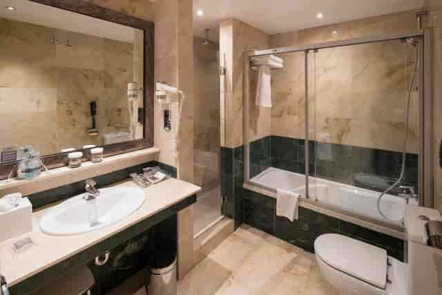 Standard hotel bathroom in Catalonia Born for group room blocks and event accommodation.
