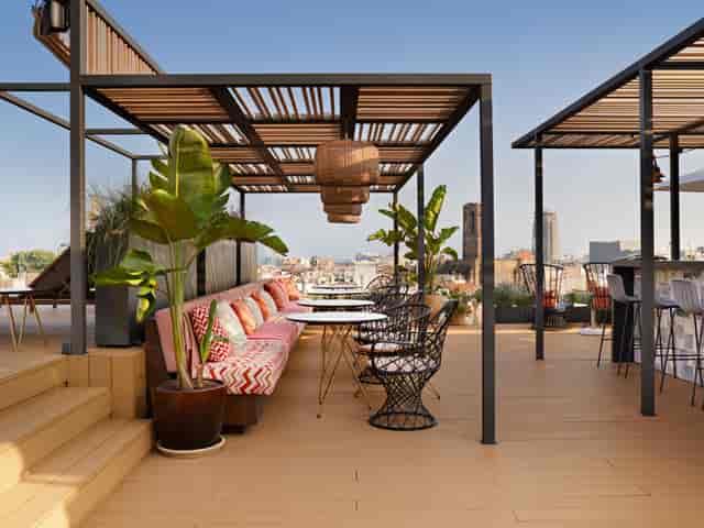 Terraza de Vivi rooftop venue with banquette seating for networking events and cocktail receptions.