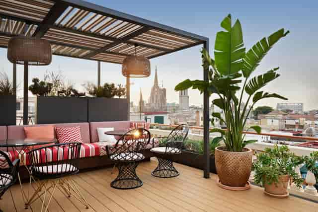 Rooftop bar with skyline views, perfect for exclusive VIP cocktail hours and networking events.