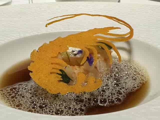 Gourmet Torre starter at Cinc Sentits, elegant plated dish for luxury gala and VIP dinner.