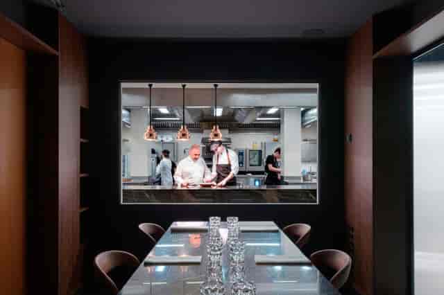 Semi-private dining room at Cinc Sentits for executive retreats and corporate hospitality events.
