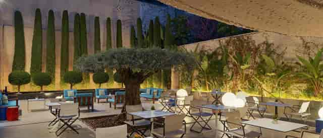 Outdoor cocktail venue at Gallery Hotel Barcelona with lounge seating for networking events.