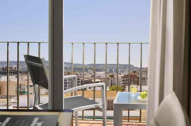 Gastrobar terrace with panoramic views for VIP corporate events and intimate breakout meetings.