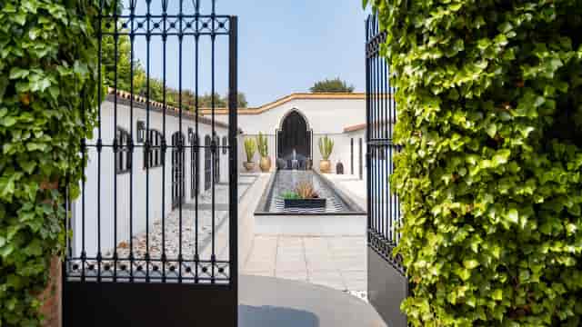 Gated Villa entrance at Gran Villa Rosa, ideal for upscale cocktail receptions and event arrivals.