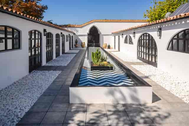 Mediterranean courtyard at Villa Gran Villa Rosa for luxury event venue or cocktail reception.