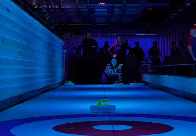 The Lodge at Roxy Lanes Edinburgh: immersive teambuilding space with atmospheric lighting.