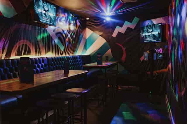 Karaoke room at Roxy Lanes Edinburgh with banquette seating for private party and networking events.