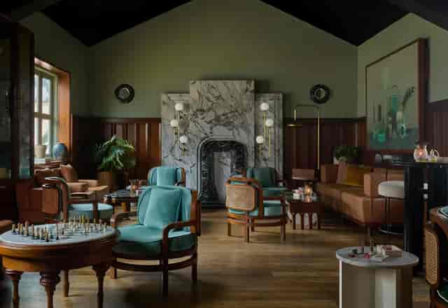 Velvet Room at Mandala Club: elegant lounge for networking events with natural light and stylish decor.