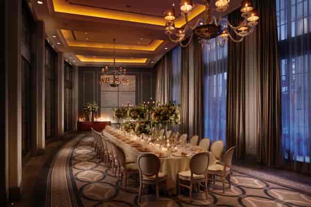 Elegant banquet room at Corinthia London with floral decor, perfect for upscale events.