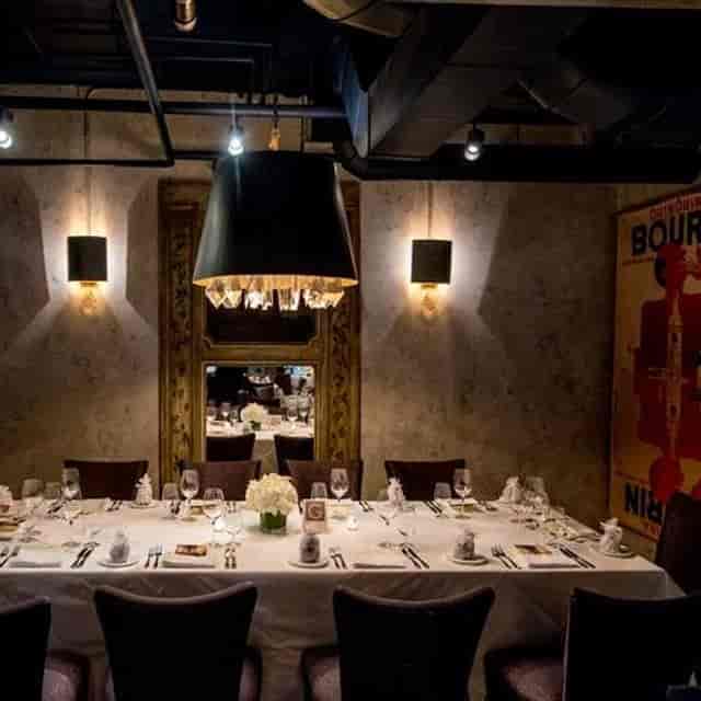 Elegant GEORGE Restaurant dining room for VIP corporate events and high-end private networking.