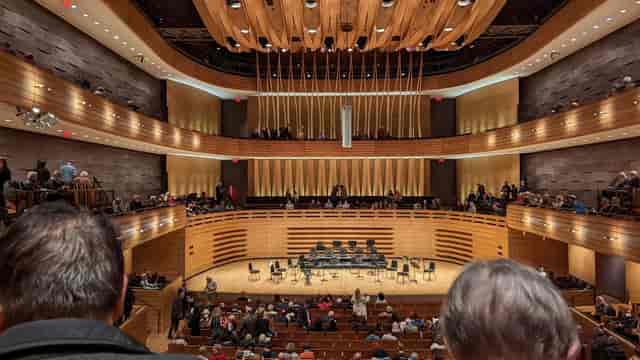 Mazzoleni Concert Hall with wood finishes for corporate events and award ceremonies.