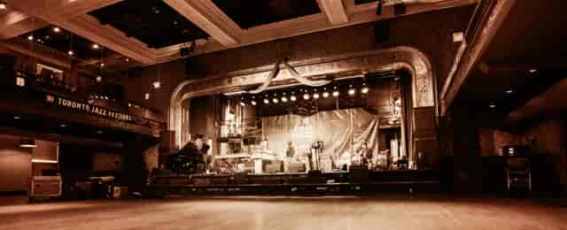 Jazz Festival stage in 888 Yonge heritage ballroom with vintage architecture for event venues.