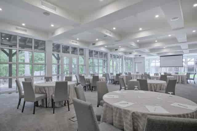 Langdon Hall banquet room with floor-to-ceiling windows for corporate meetings and social events.