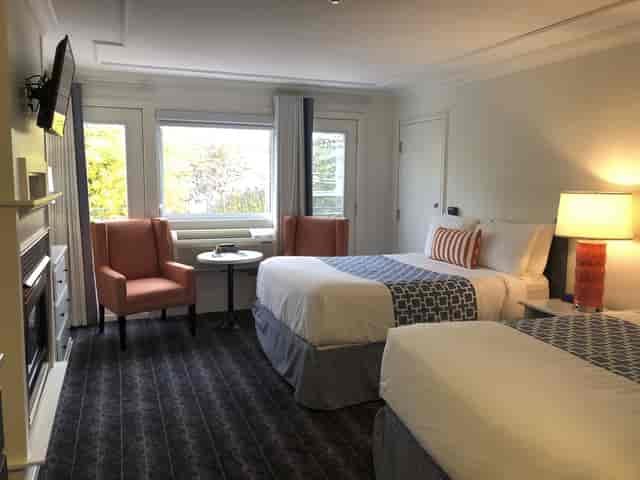 Huronia Room double-occupancy hotel room for event breakout sessions and speaker accommodation.