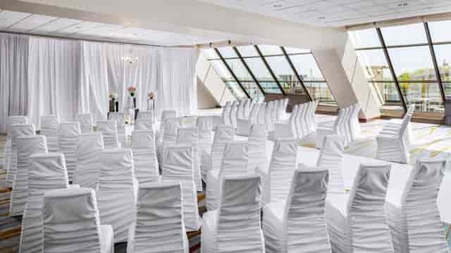 Westin Harbour Castle conference room: theater seating with elegant backdrop for corporate events.