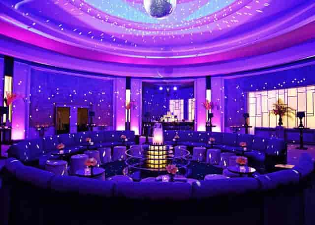 Clipper Room at The Carlu featuring circular banquettes for luxury networking reception events.