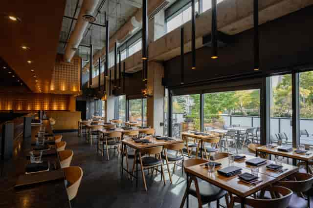 Industrial-chic North York event venue with natural light for networking mixers and dinner parties.