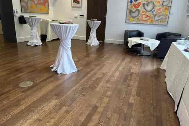 North House reception area with cocktail tables and lounge seating for professional networking.