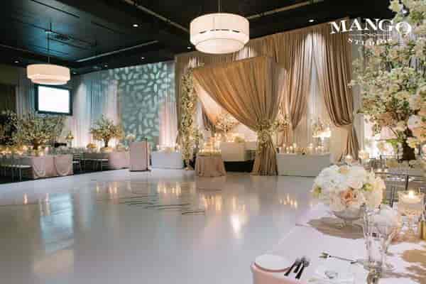 Luxury event venue Parlour with glossy dance floor for high-end weddings and galas.