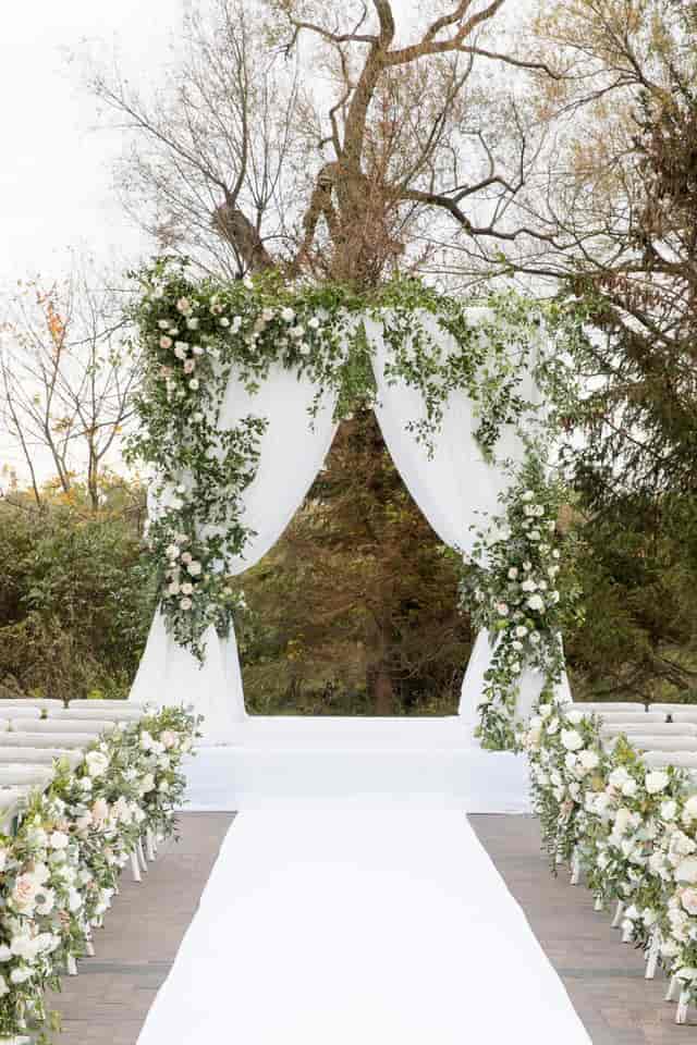 Arlington Estate gazebo with floral arch for romantic outdoor wedding ceremony.