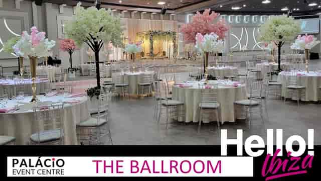 Royal Grand Ballroom with floral centerpieces for formal weddings and gala events.
