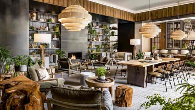 Biophilic Garden Pavilion at 1 Hotel Toronto with fireplace for executive retreats and networking.
