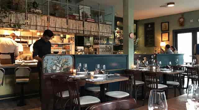 Traditional Bar in St. Lawrence with textured decor for upscale private events and client dinners.