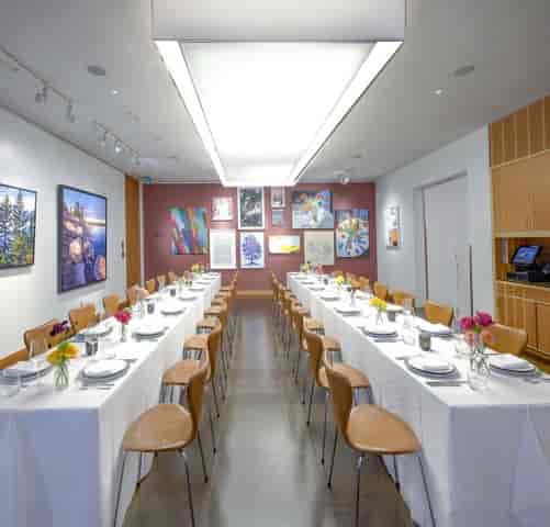 Private dining at AGO Bistro: gallery-style banquet tables for corporate events and networking.