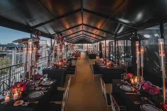 Luxury gala wedding at The Symes rooftop terrace with sophisticated marquee event decor.