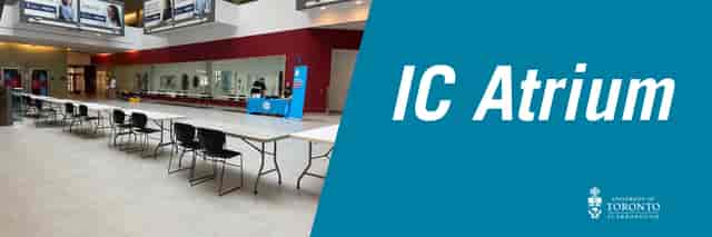 Registration desk at UTSC KW Atrium for university conference or event setup.