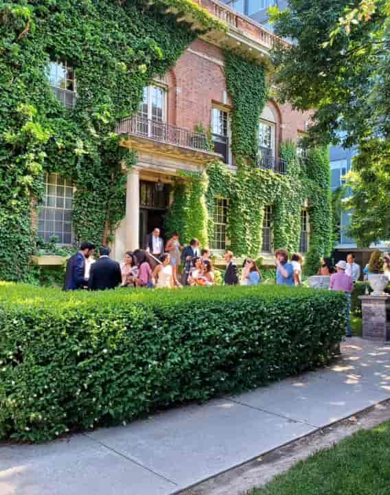 Ivy-clad Faculty Club patio: upscale outdoor corporate networking reception venue.