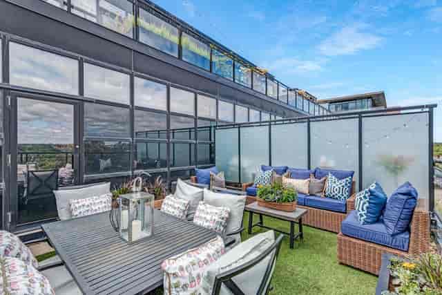 Rooftop patio with soft seating for high-end cocktail receptions and corporate networking events.