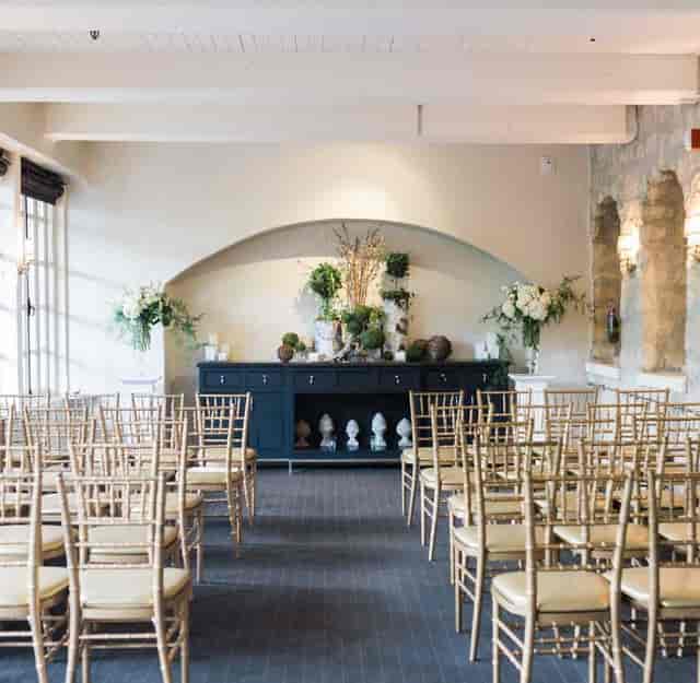 Private dining room with stone arches, ideal for intimate wedding ceremonies or board meetings.