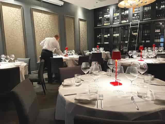 Modern private dining room at Modus Ristorante for corporate dinners and VIP events.